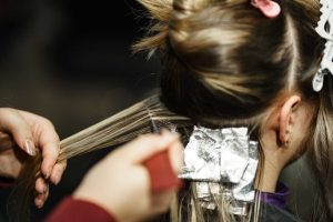 Platinum Salon ROC stylist at work